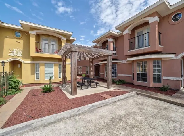 a view of a house with a swimming pool