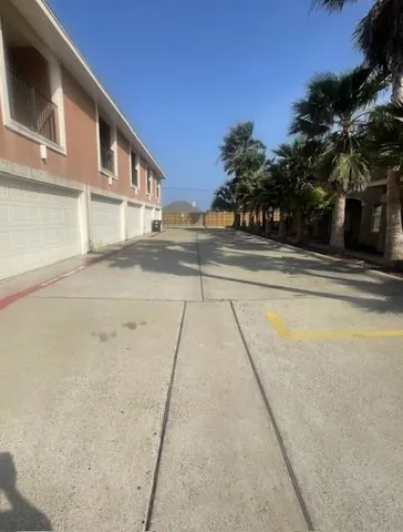 a view of a building with sitting area