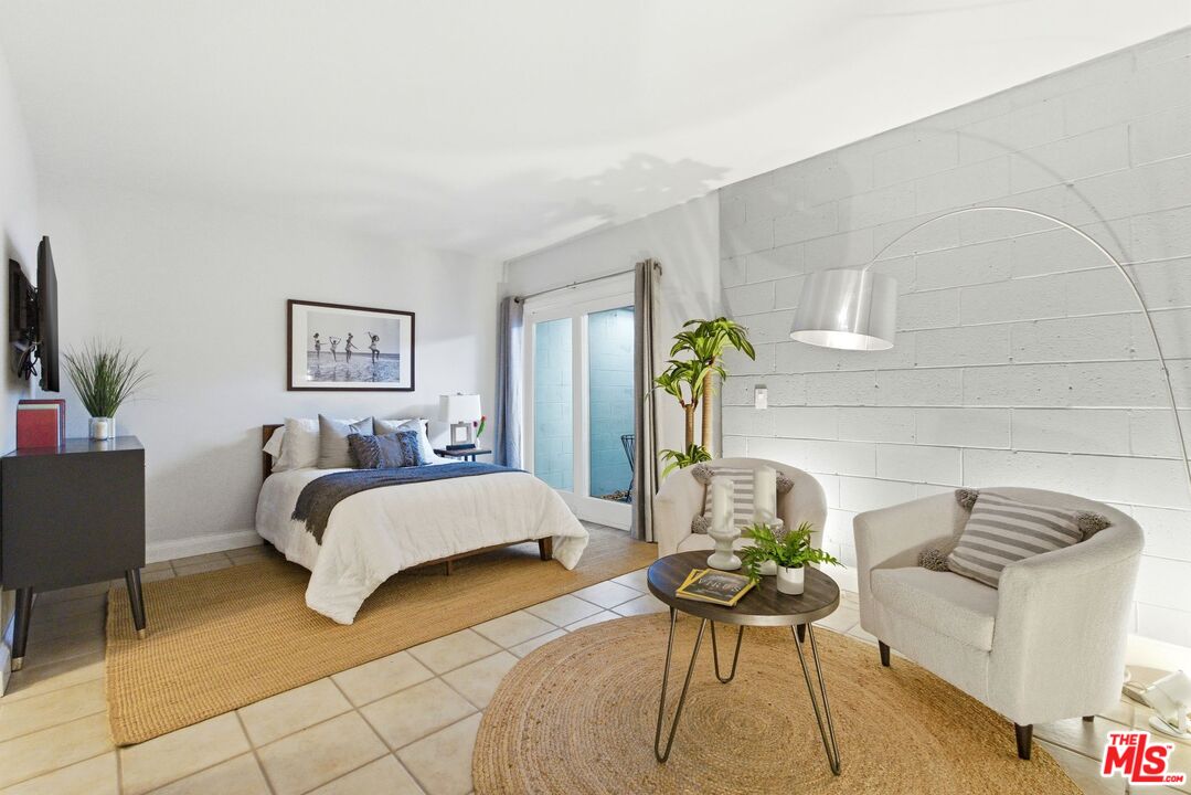 1013 16th Street, Unit 101 Santa Monica, CA 90403 - Photo 39 of 46 a living room with furniture and a couch