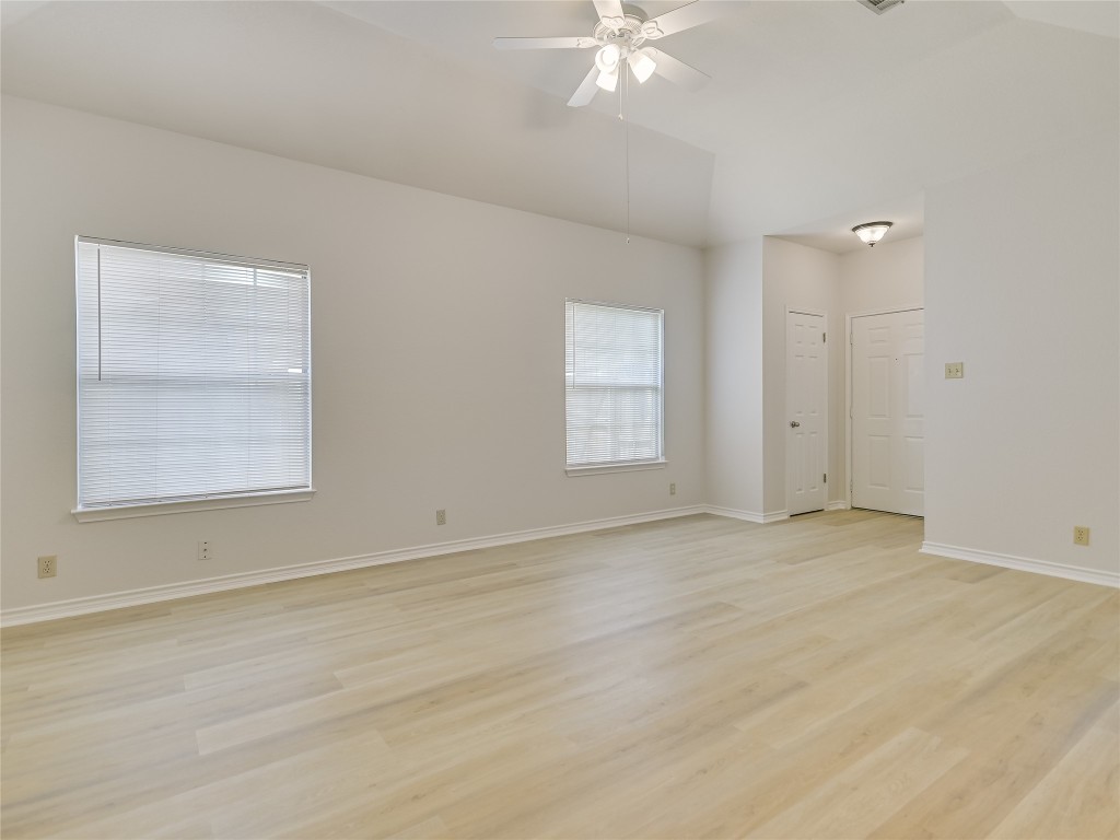 2601 Riddle Road, Unit A Austin, TX 78748 - Photo 5 of 10 an empty room with windows and closet