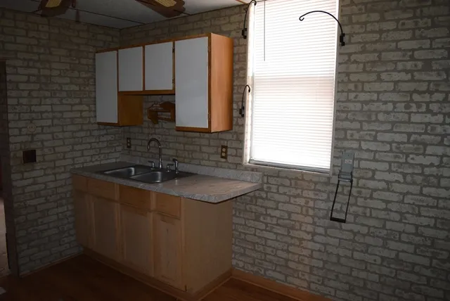 a bathroom with a sink and toilet