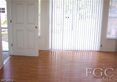 8233 Albatross Road Fort Myers, FL 33967 - Photo 5 of 8 a view of livingroom with hardwood