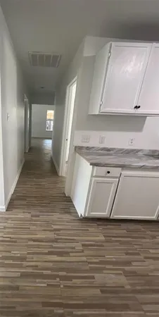 a bathroom with a toilet a sink and bathtub