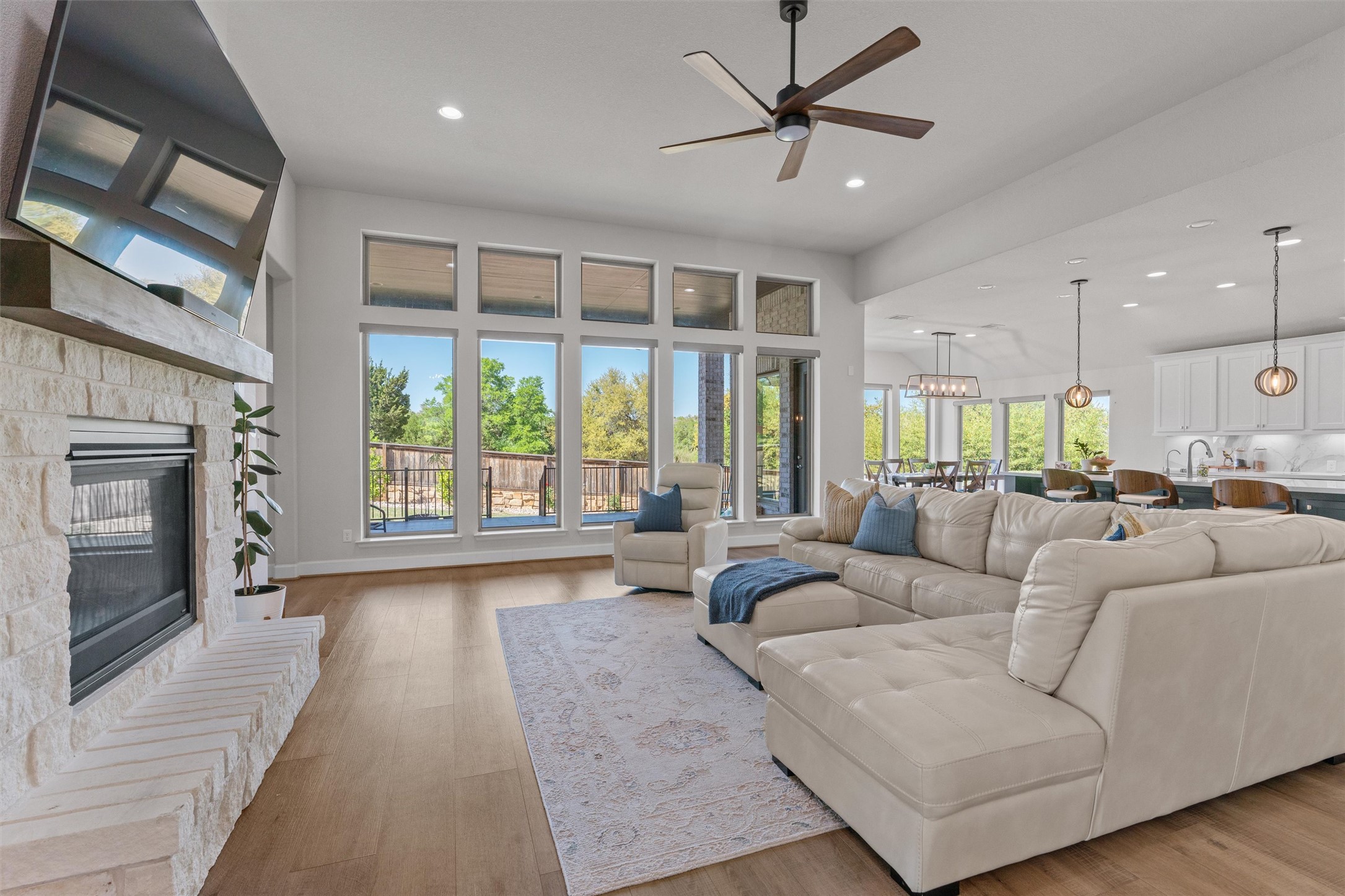 101 Pienza Drive Georgetown, TX 78628 - Photo 2 of 40 a living room with furniture and a fireplace