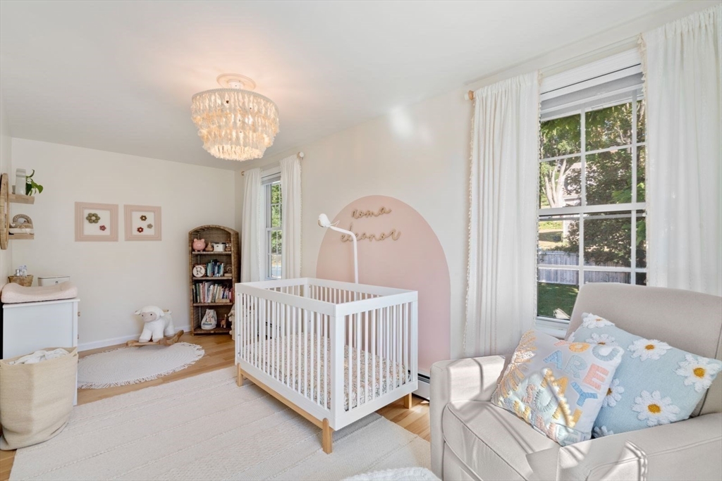 31 Broad Cove Road Hingham, MA 02043 - Photo 17 of 22 a view of a room that has a bed and a window