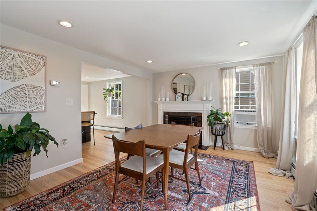 31 Broad Cove Road Hingham, MA 02043 - Photo 4 of 22 a view of a livingroom with furniture and a potted plant