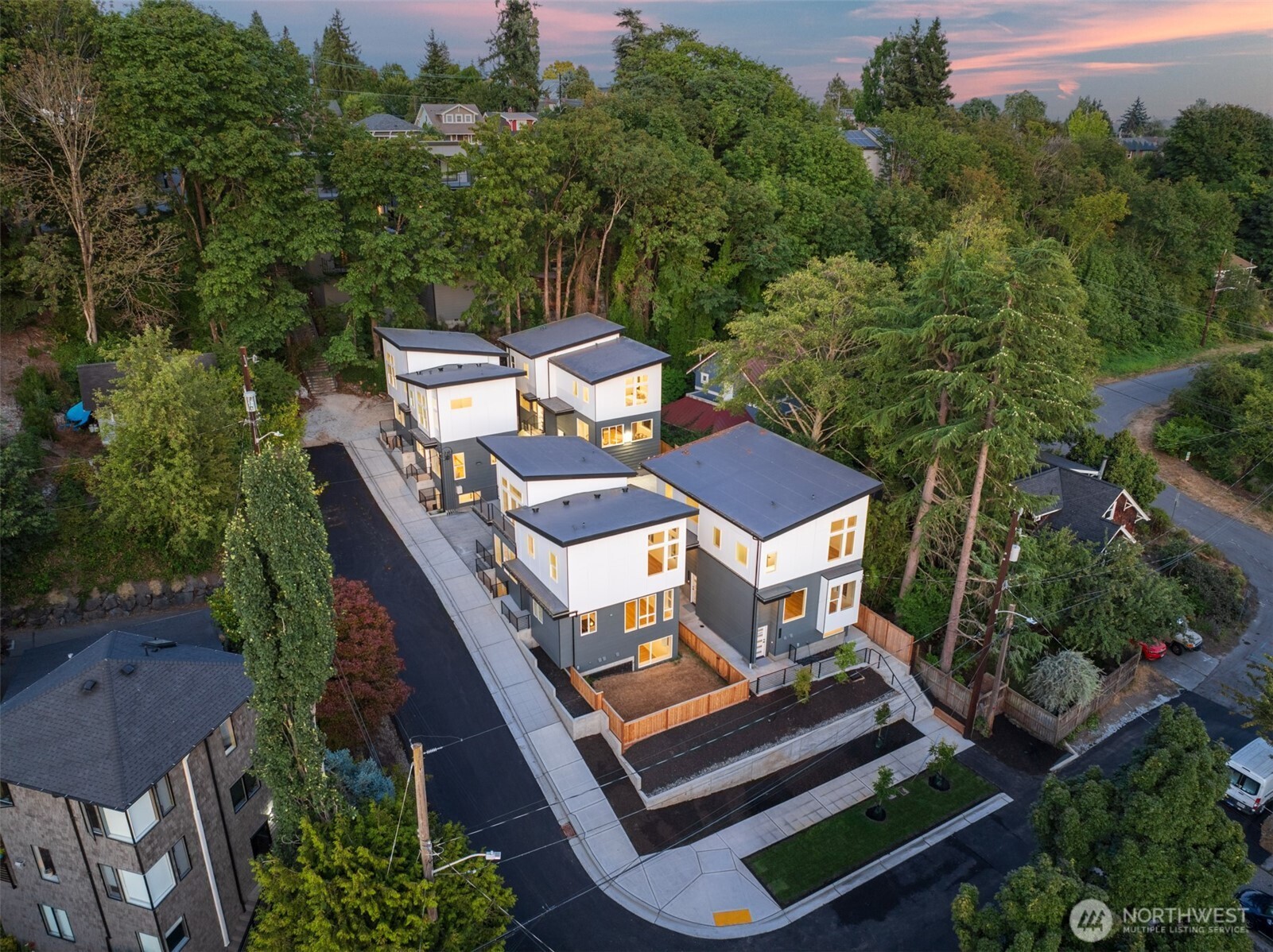 1802 28th Avenue South Seattle, WA 98144 - Photo 3 of 4 an aerial view of a house with pool and trees all around