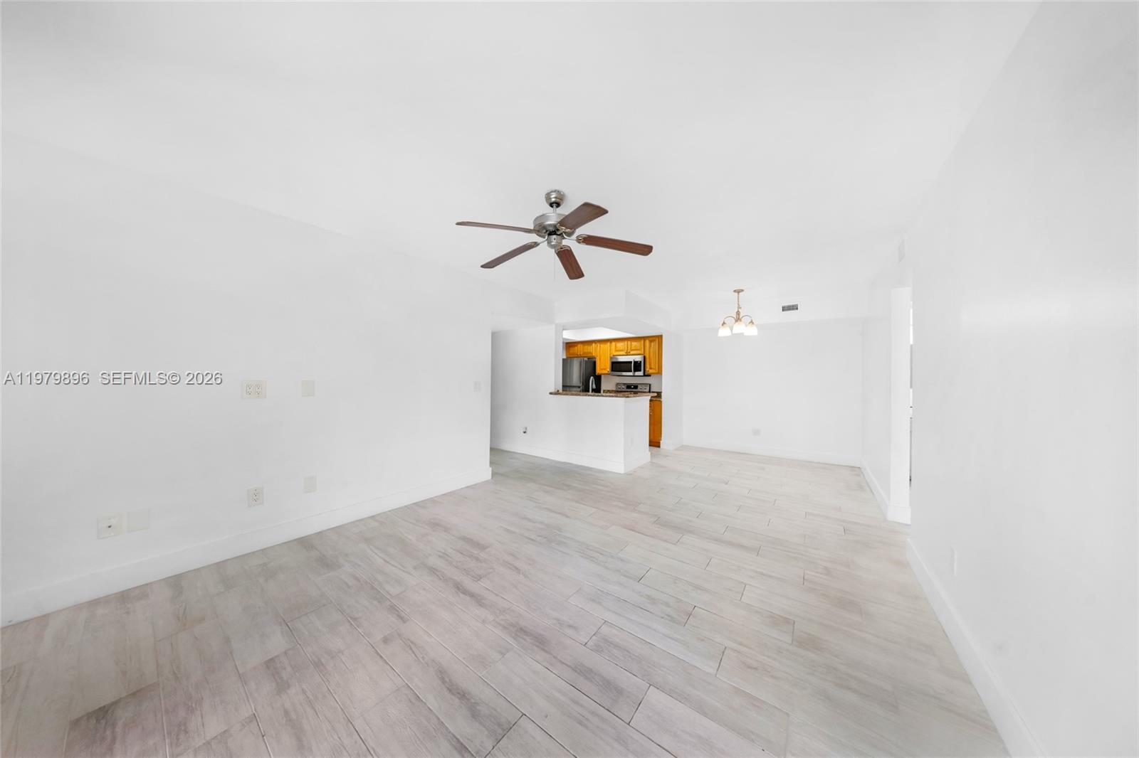 5760 Rock Island Road, Unit 321 Tamarac, FL 33319 - Photo 13 of 36 a view of a room with a window