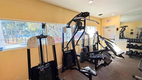 a view of a room with gym equipment