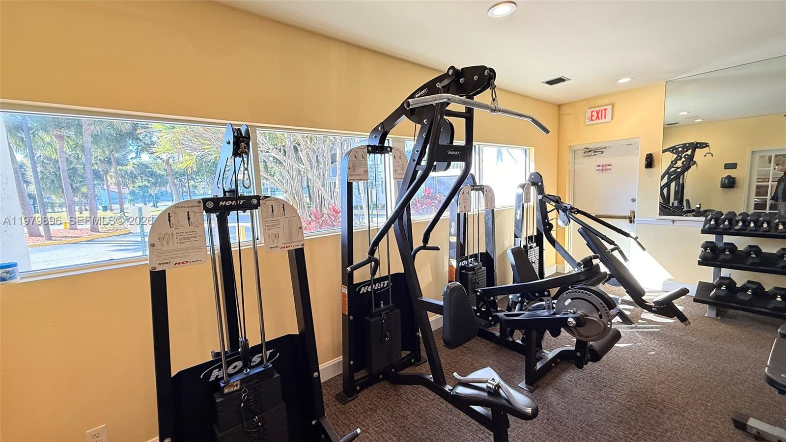 5760 Rock Island Road, Unit 321 Tamarac, FL 33319 - Photo 35 of 36 a view of a room with gym equipment