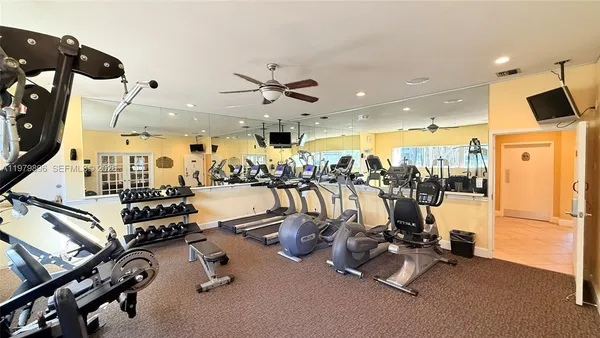 a view of a room with gym equipment