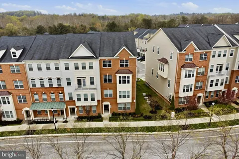a view of multiple houses with a city street