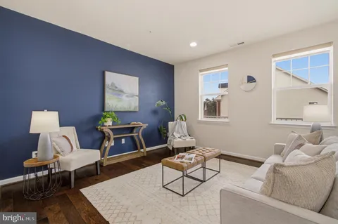 a workspace with furniture and rug