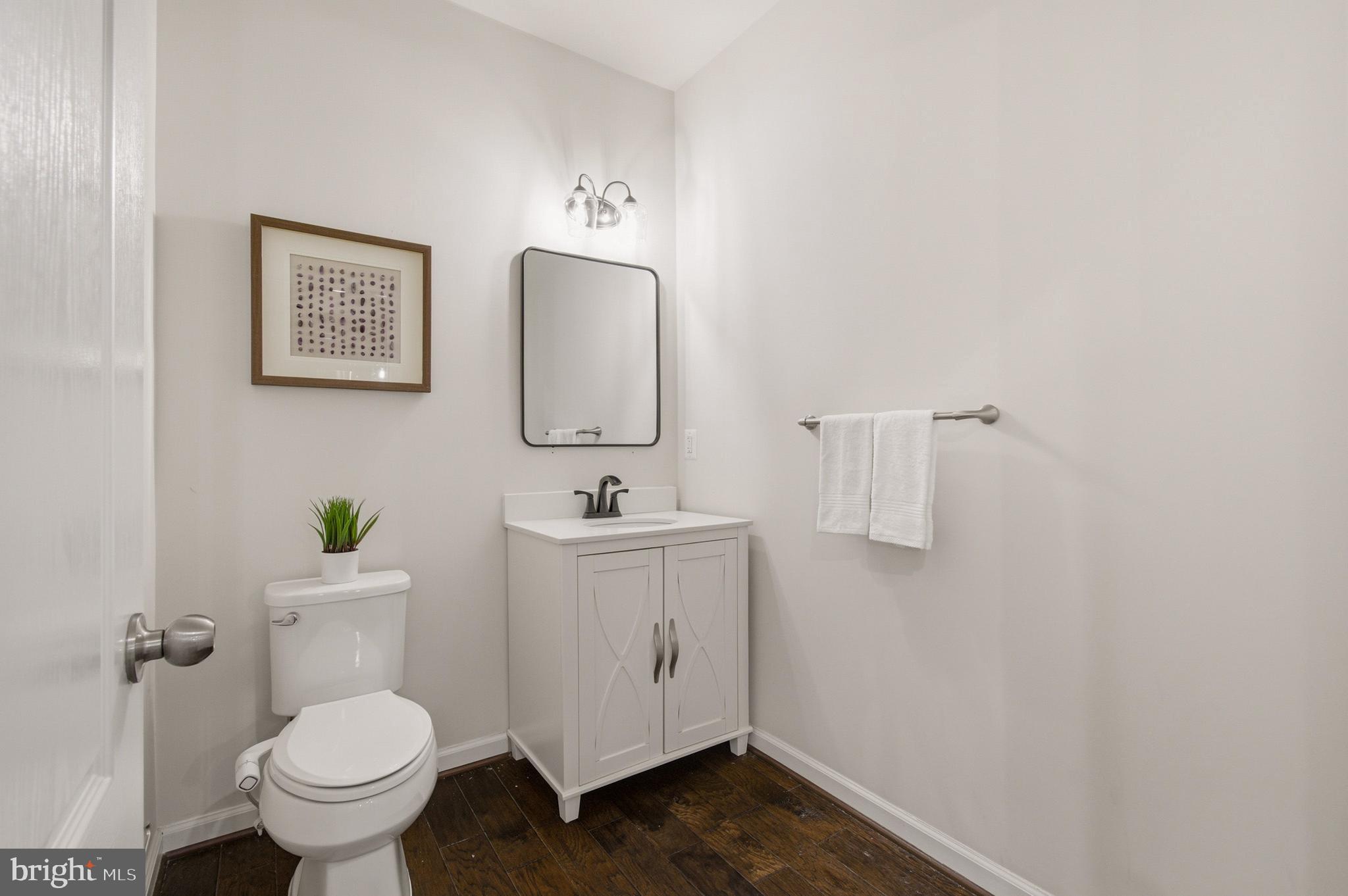 7015 Starwort Way, Unit A Hanover, MD 21076 - Photo 32 of 69 a bathroom with a toilet and a sink