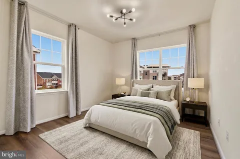 a terrace with outdoor seating and city view