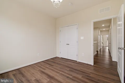 a picture of a room with a white wall and a white wall