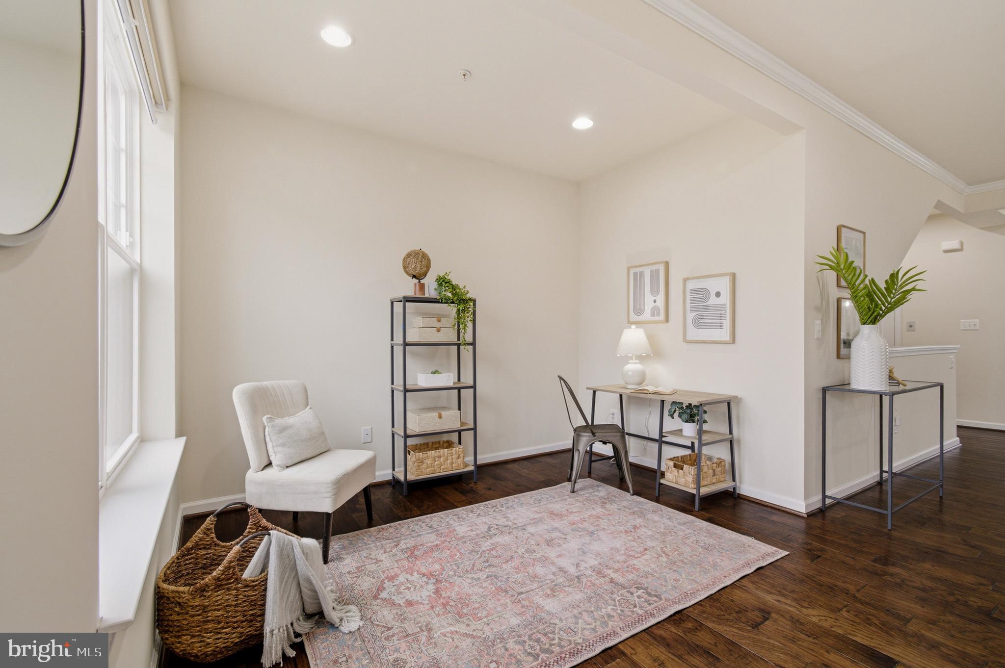 7015 Starwort Way, Unit A Hanover, MD 21076 - Photo 7 of 69 a living room with furniture and wooden floor