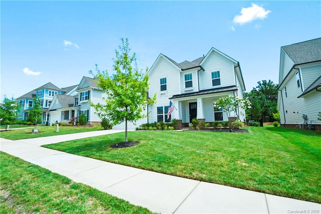 210 Hampton Trail Drive Fort Mill, SC 29708 - Photo 2 of 24 a front view of a house with a yard and garage