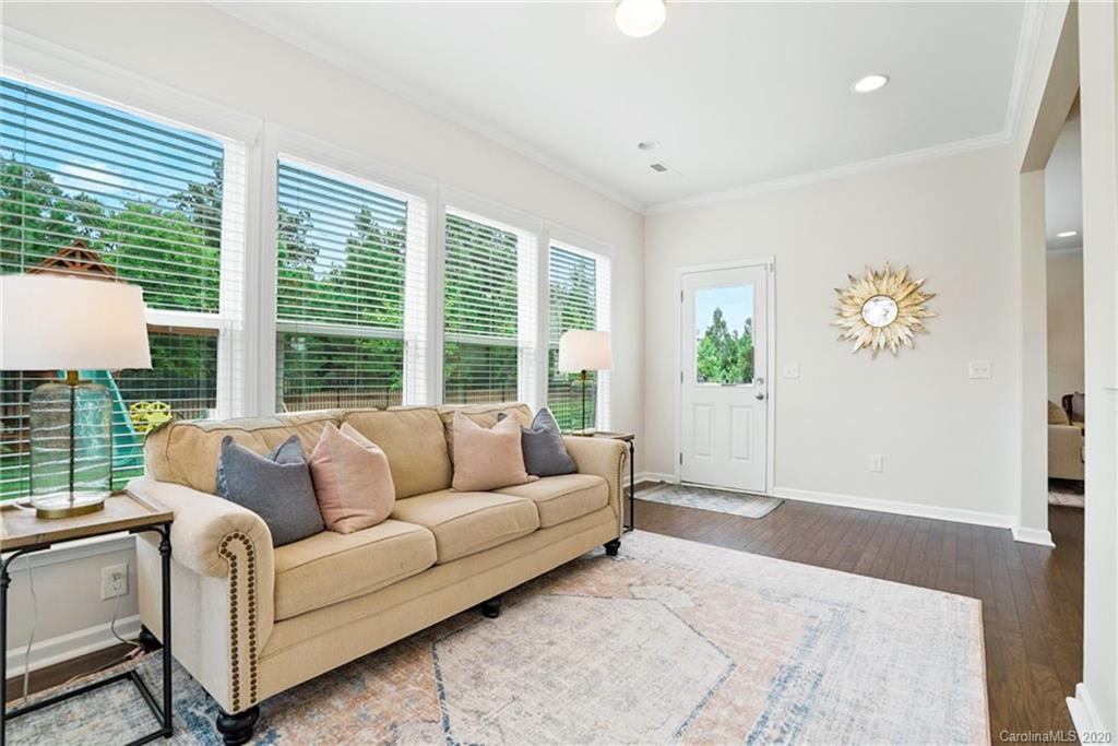 210 Hampton Trail Drive Fort Mill, SC 29708 - Photo 11 of 24 a living room with furniture and a large window