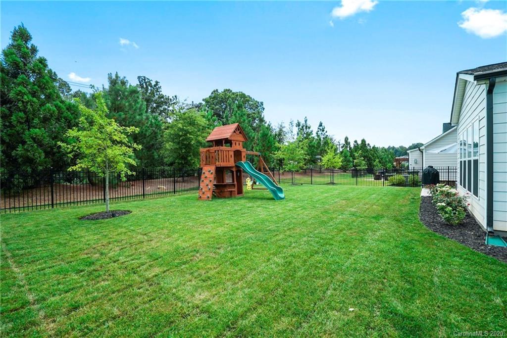 210 Hampton Trail Drive Fort Mill, SC 29708 - Photo 23 of 24 a view of a house with a backyard