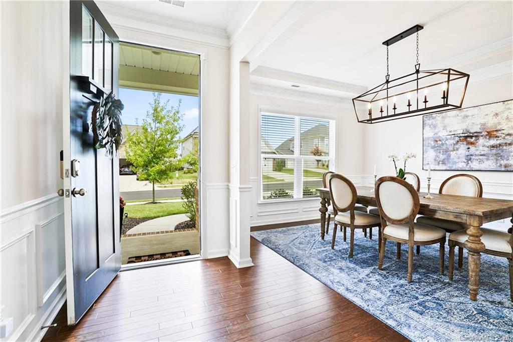 210 Hampton Trail Drive Fort Mill, SC 29708 - Photo 4 of 24 a view of a dining room with furniture window and wooden floor