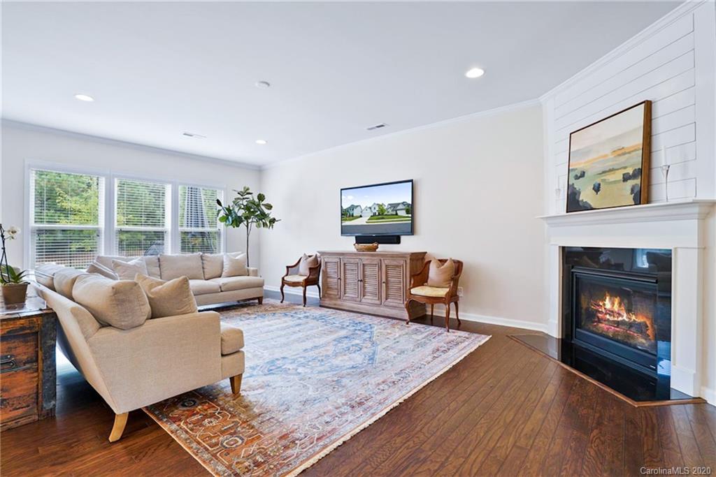 210 Hampton Trail Drive Fort Mill, SC 29708 - Photo 10 of 24 a living room with furniture and a fireplace