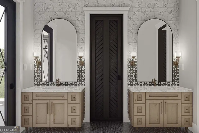 a bathroom with a mirror and a sink