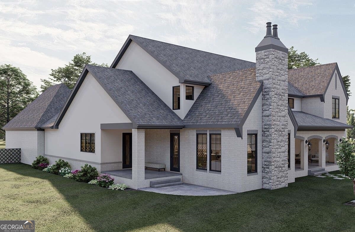 0 Ebenezer Road Fayetteville, GA 30215 - Photo 16 of 18 a front view of a house with a yard