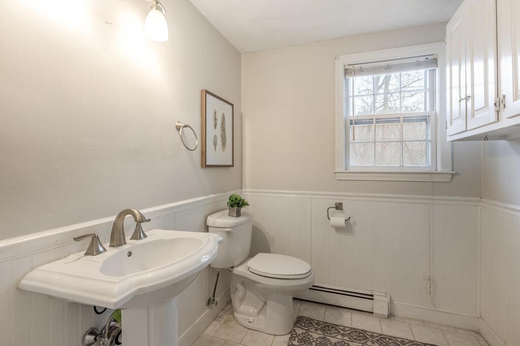 20 Argilla Road Ipswich, MA 01938 - Photo 15 of 33 a bathroom with a toilet sink and mirror