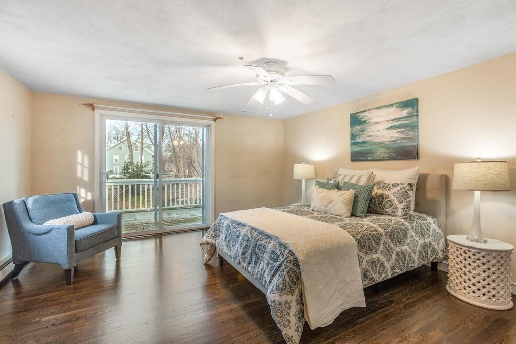 20 Argilla Road Ipswich, MA 01938 - Photo 18 of 33 a bedroom with a bed and a chair