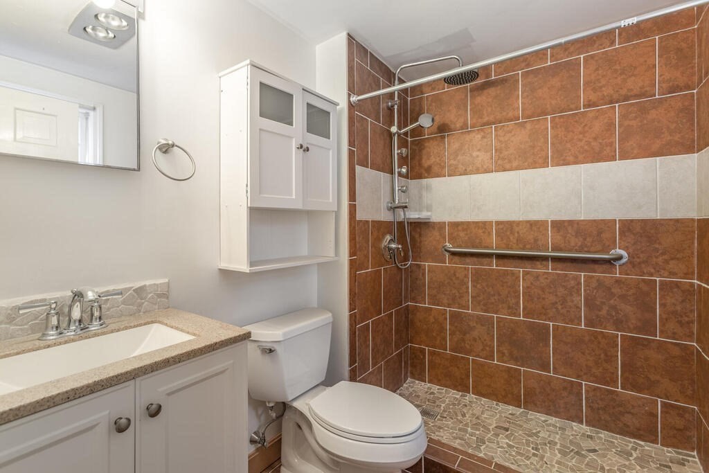 20 Argilla Road Ipswich, MA 01938 - Photo 20 of 33 a bathroom with a sink a toilet and shower