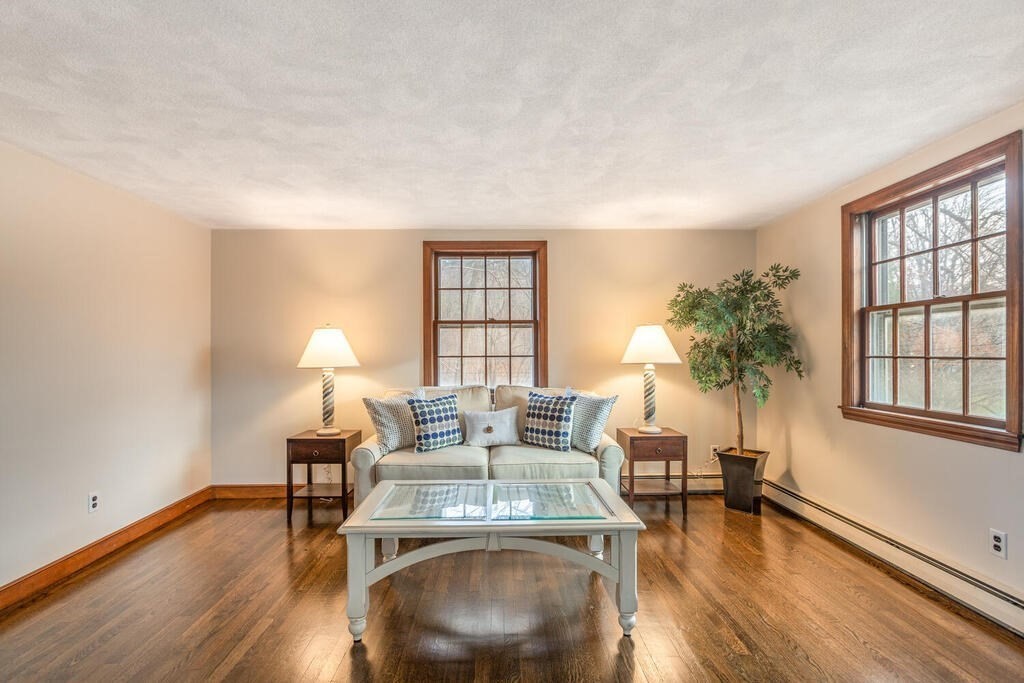 20 Argilla Road Ipswich, MA 01938 - Photo 5 of 33 a living room with furniture and a wooden floor