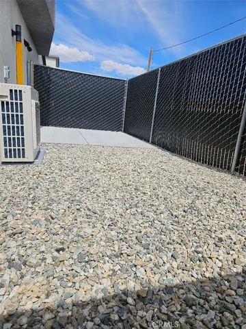 a view of a living room with a wooden floor