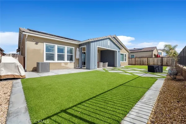 a house view with a garden space