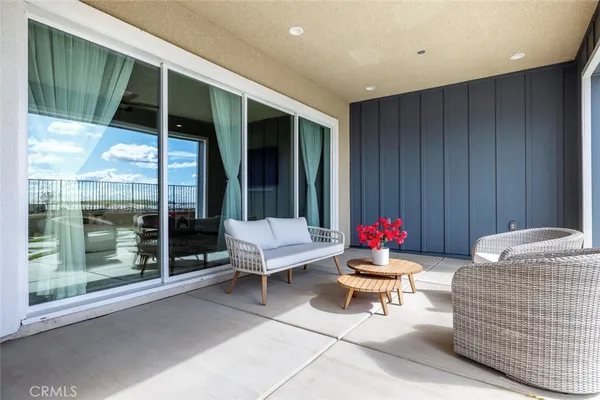 a living room with furniture and window