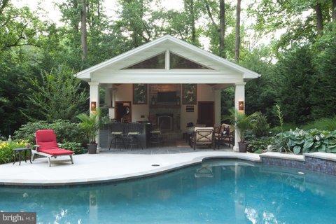 1313 Doves Cove Road Baltimore, MD 21286 - Photo 22 of 30 a view of a house with pool yard and sitting area