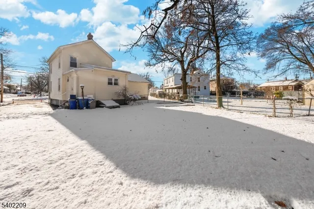 a view of a road with a building in the background