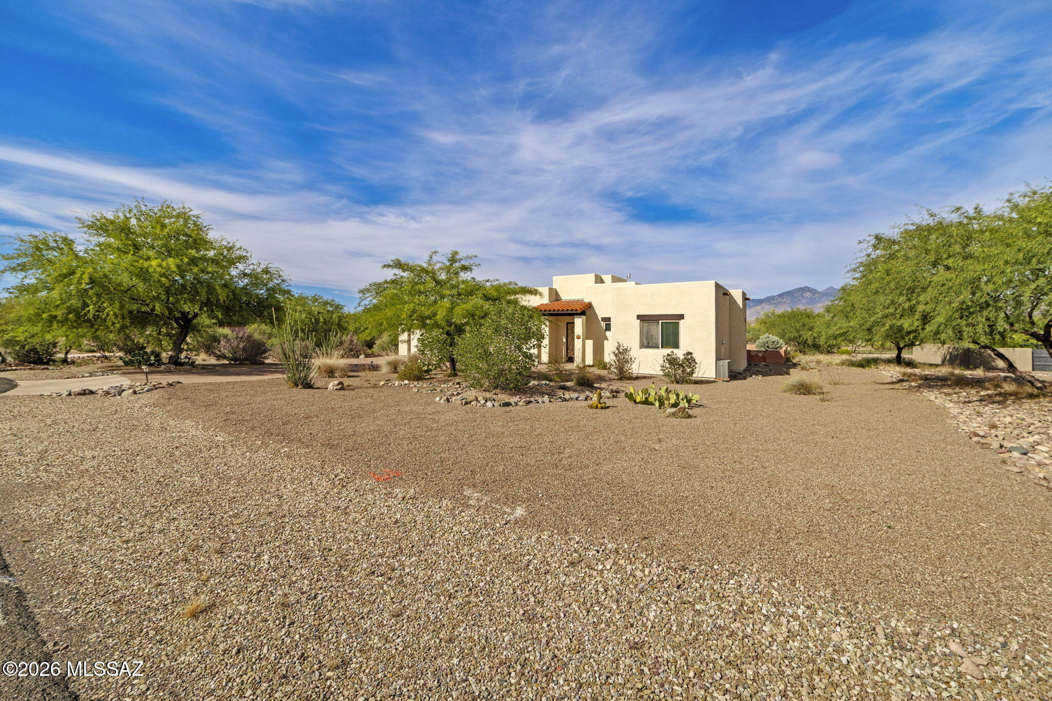 45 High View Court Tubac, AZ 85646 - Photo 7 of 44 a picture of a houses with a road