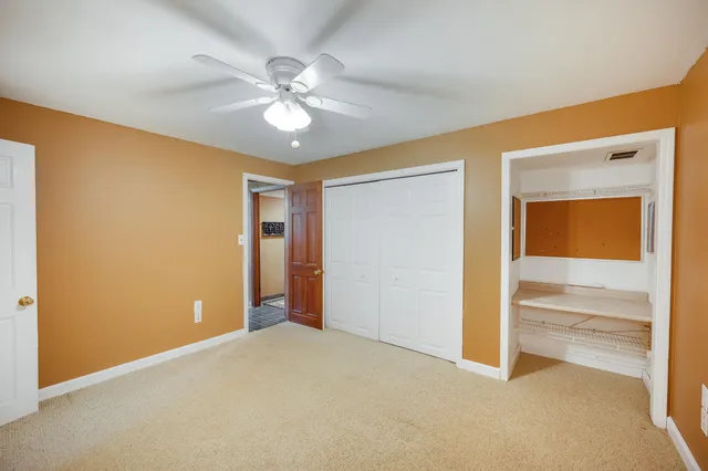 a view of front door of house and stairs