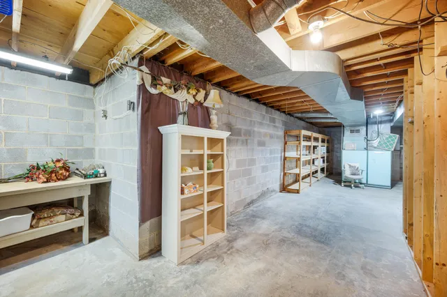 a front view of house with yard and outdoor seating