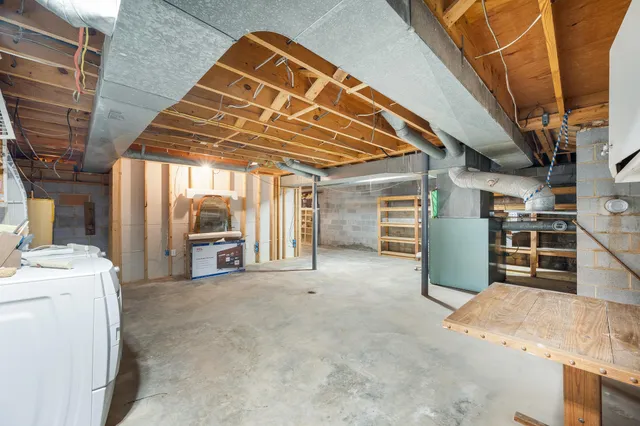 a sitting area with furniture and garden view