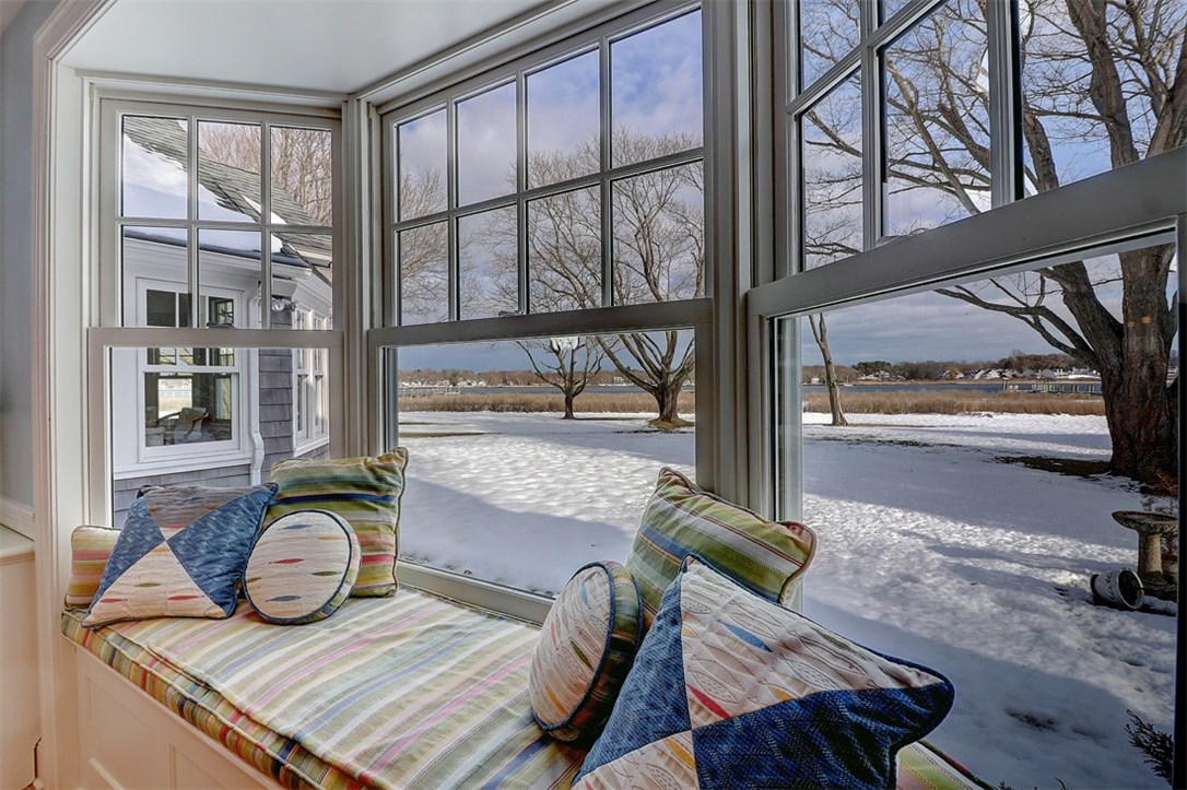 160 Adams Point Road Barrington, RI 02806 - Photo 14 of 40 The window seat located in the dining room is a great place to curl up with a book while watching the beautiful scenery.