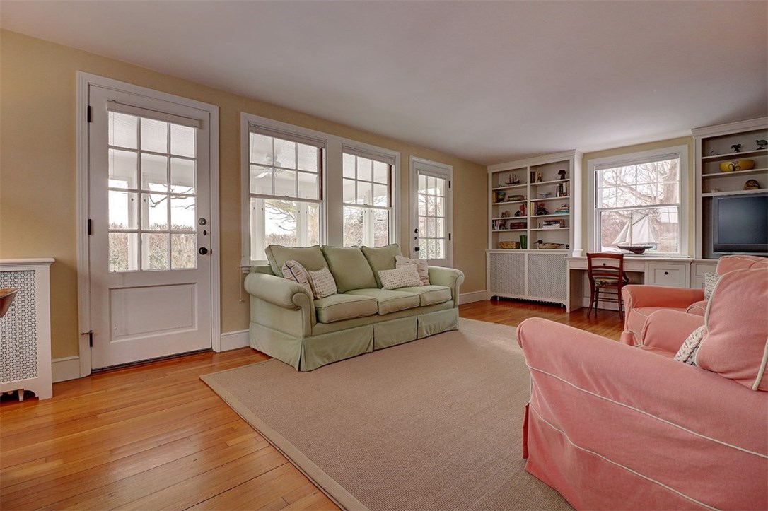 160 Adams Point Road Barrington, RI 02806 - Photo 17 of 40 Two doors lead out to the screened porch.