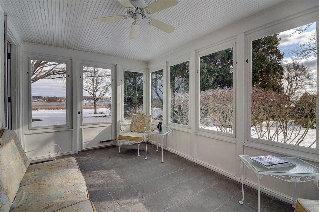 160 Adams Point Road Barrington, RI 02806 - Photo 18 of 40 Enjoy the ocean breezes on the screened porch with a cup of coffee or your favorite drink.