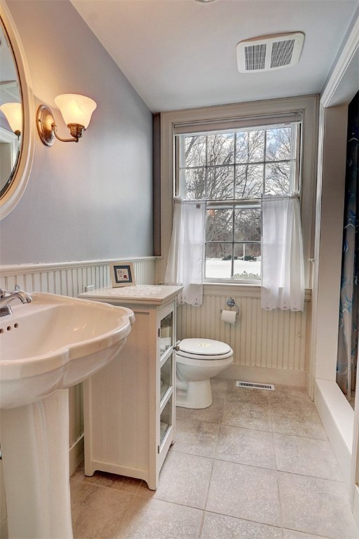 160 Adams Point Road Barrington, RI 02806 - Photo 19 of 40 Remodeled bathroom with shower.