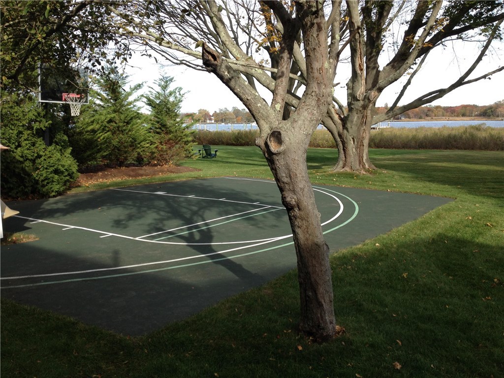 160 Adams Point Road Barrington, RI 02806 - Photo 30 of 40 House has a basketball court and a shed.