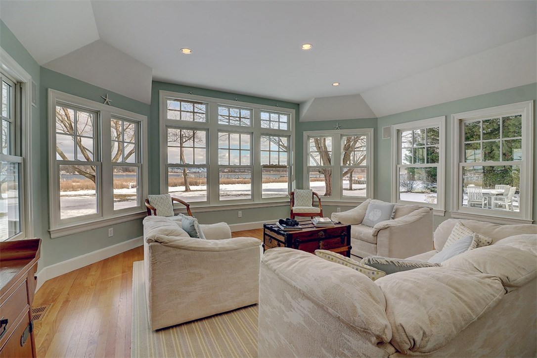 160 Adams Point Road Barrington, RI 02806 - Photo 4 of 40 Windows are on all sides making this room very bright and sunny.