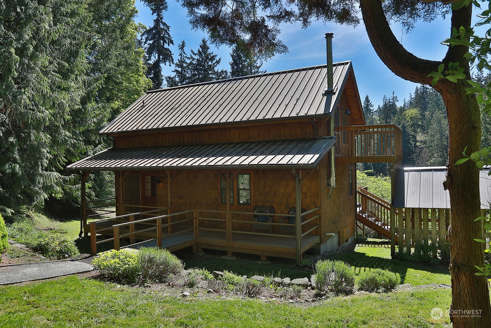 a view of a house with a street