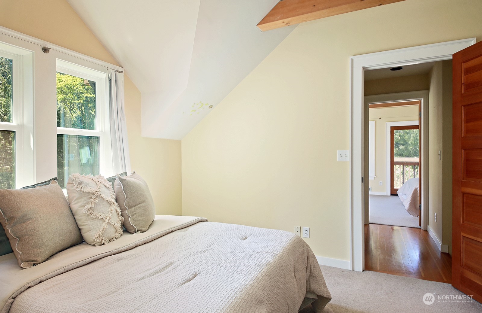 5368 Mapleglen Road Langley, WA 98260 - Photo 14 of 40 a bedroom with a bed and a window