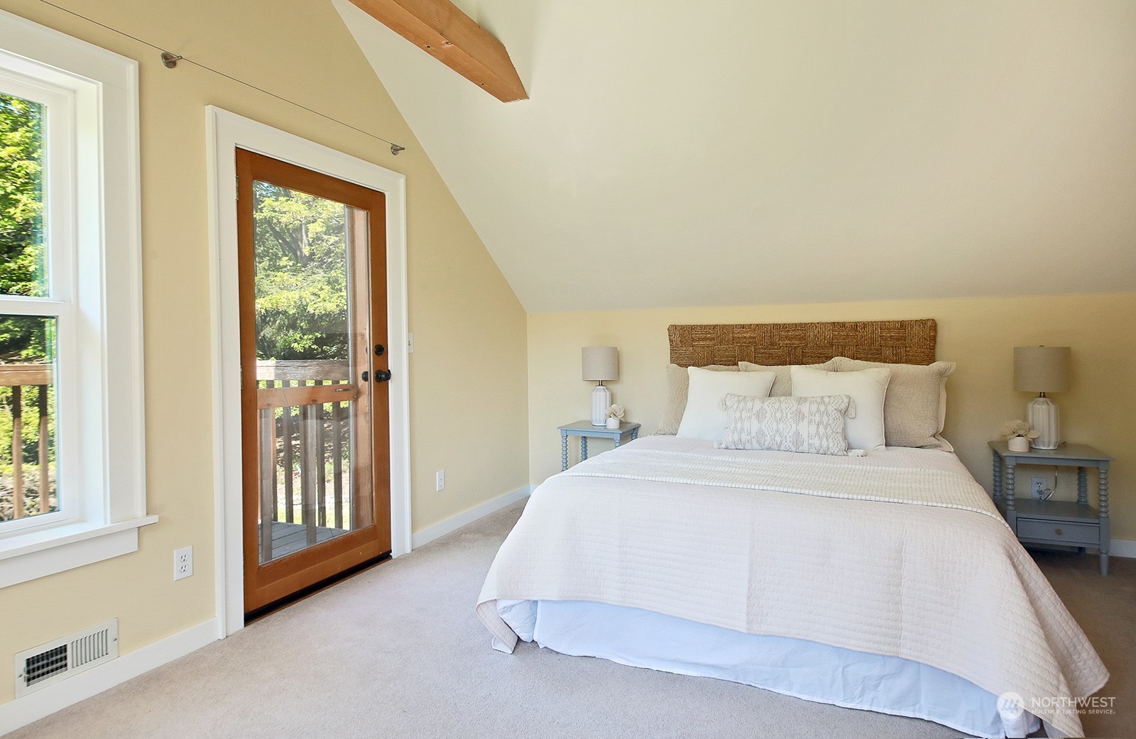 5368 Mapleglen Road Langley, WA 98260 - Photo 19 of 40 a bedroom with a large bed and a window